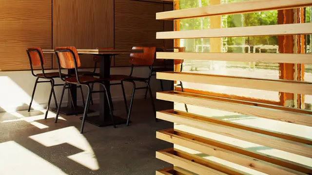 Minimalistisch interieur met donkere naadloze vloer, natuurlijk licht en moderne houten elementen. Een strak ontwerp met schone lijnen en high-end uitvoering.